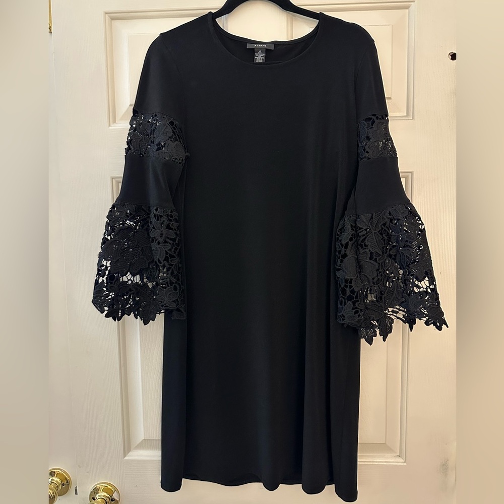 Elegant Black Shift Dress with Lace Bell Sleeves
